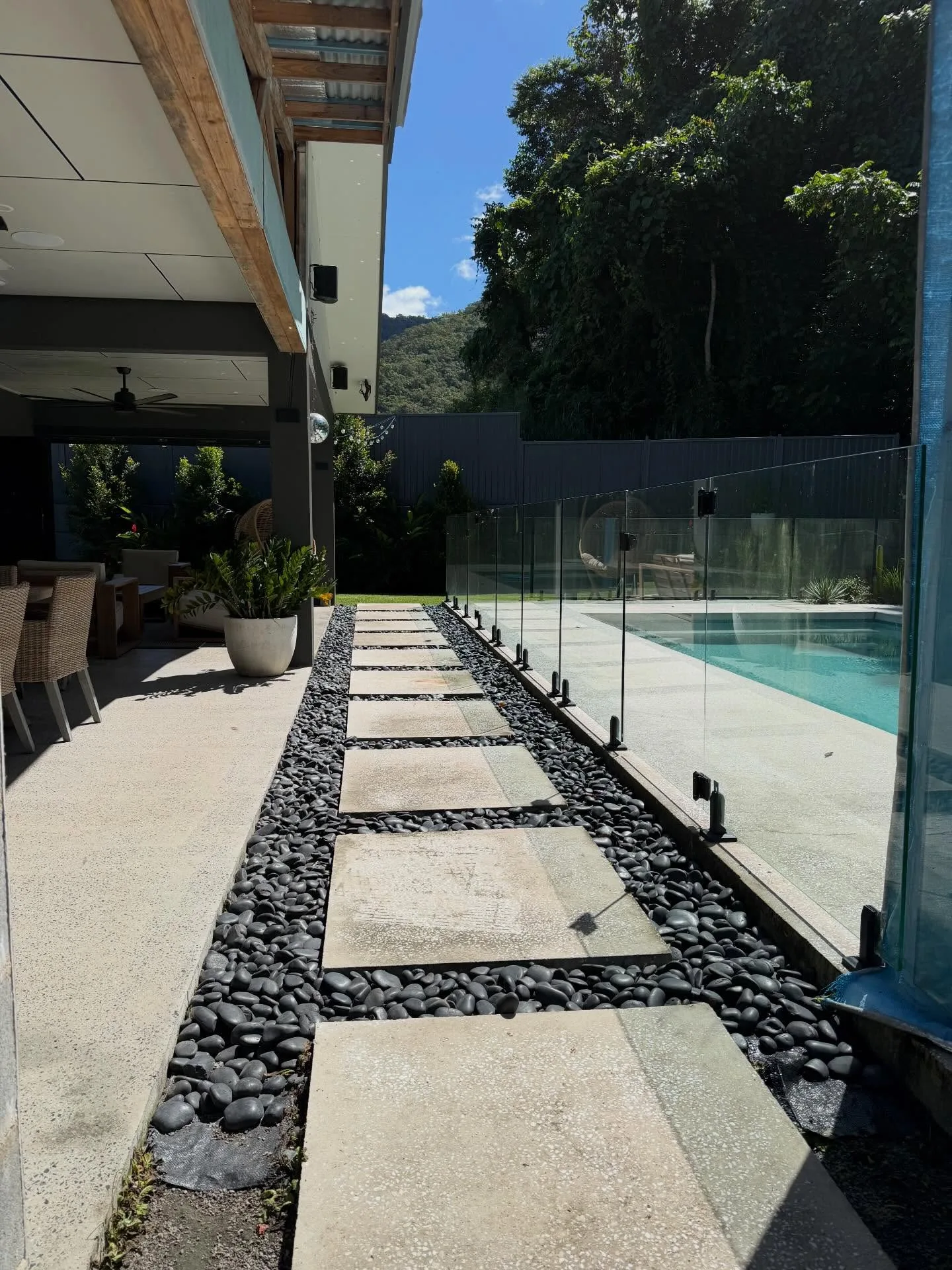 Exposed aggregate pool surround, concrete pavers, and perimeter fence deep clean. Fresh, clean, and ready for the tropical FNQ summer!